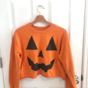 Orange Jack O Lantern cropped graphic tee